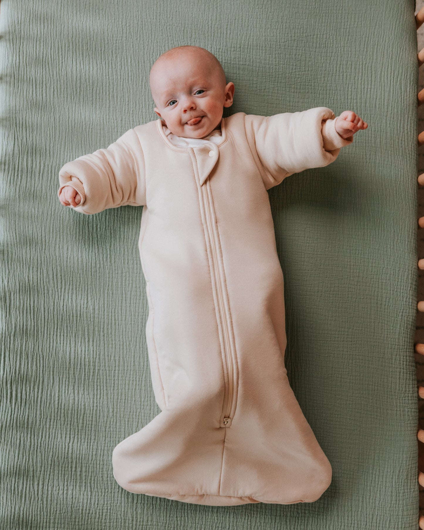 Time to transition out of the swaddle? Then it's time for the Dreamy Peach Co. Transition Sleep Sack! It blunts the startle reflex, while keeping baby safe and cozy. Makes dropping the swaddle a breeze.